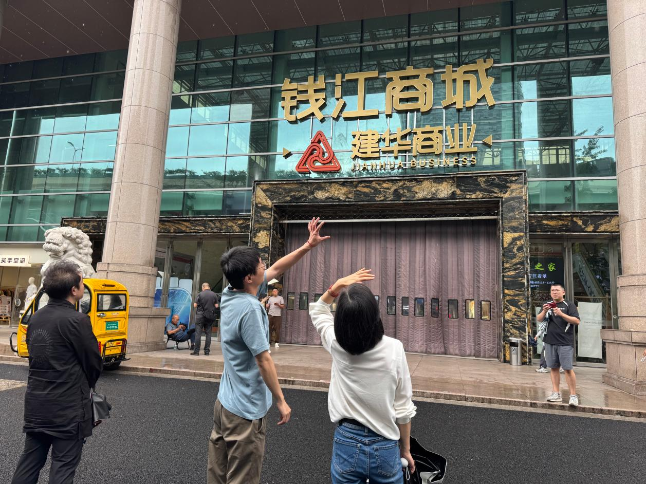 区商务局走访钱江商城  调研市场转型升级工作
